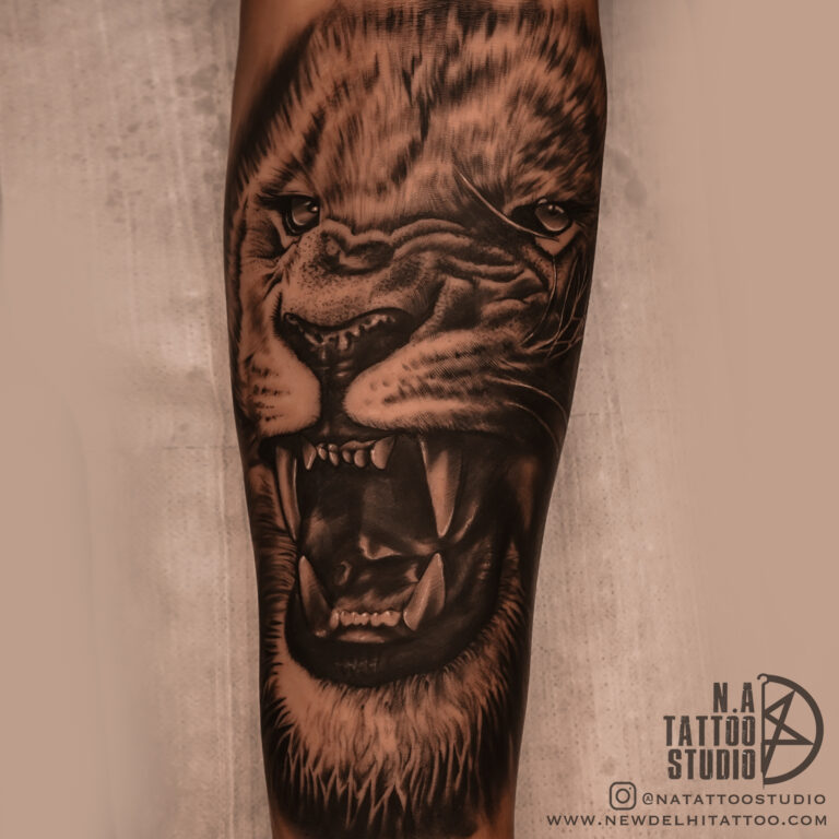 lion tattoo by tattoosbyabhishek